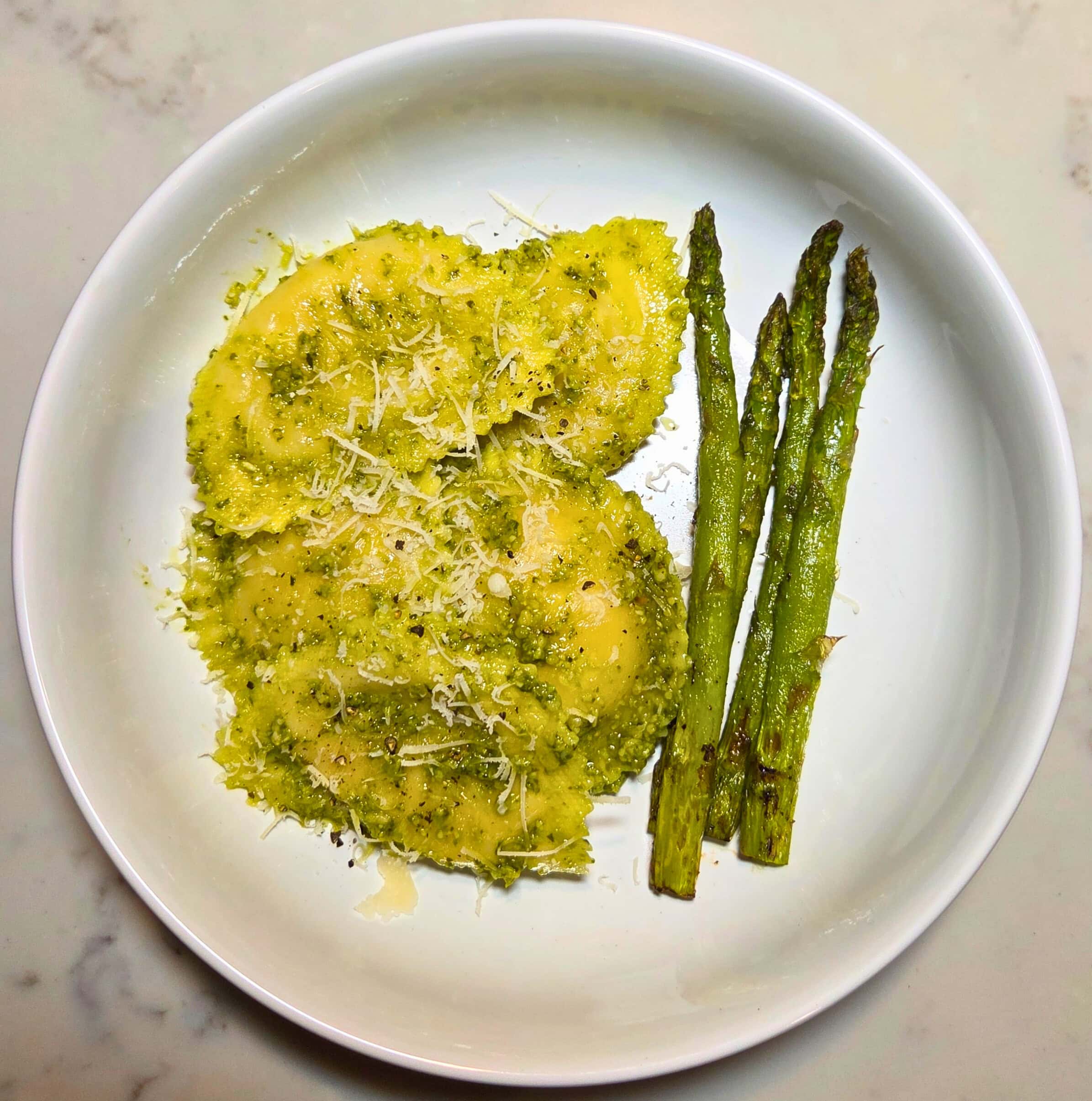 pesto ravioli with roasted asparagus